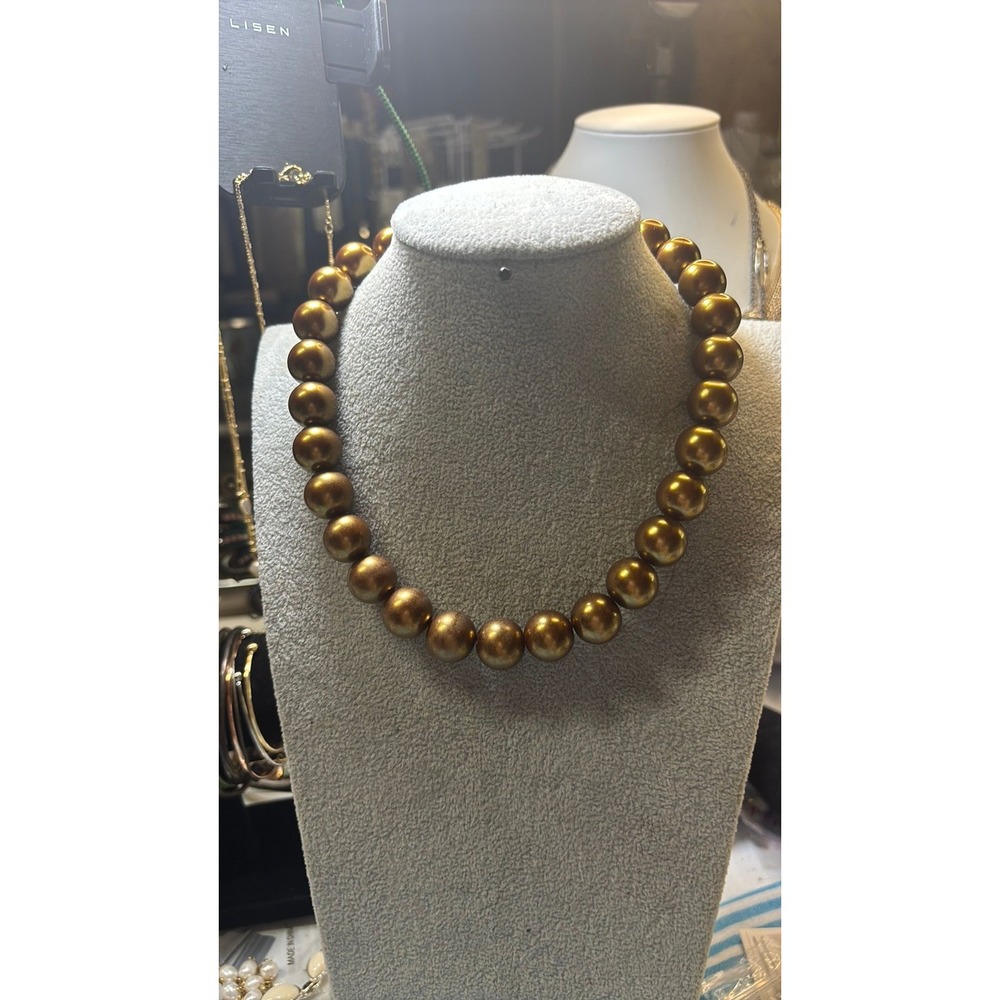 #21. Vintage-style Chunky Golden Beaded Necklace